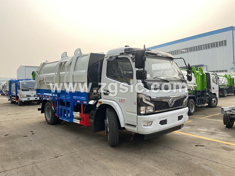 程力集團東風大多利卡側裝帶壓縮垃圾車 程力集團東風大多利卡側裝帶壓縮垃圾車